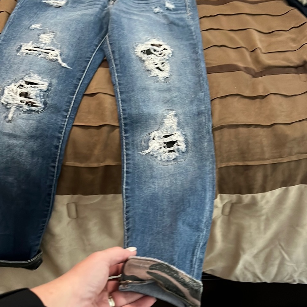 Beautiful Judy blue jeans, worn a couple times with a little camo accent